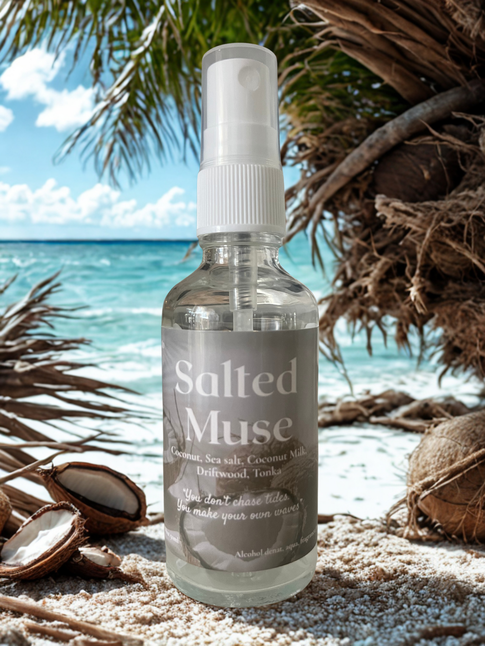 Salted Muse Hair & Body Mist by Memento Scents, styled with sea-worn driftwood, golden coconut shells, and a salt-kissed breeze backdrop, evoking the scent of the coast reimagined.