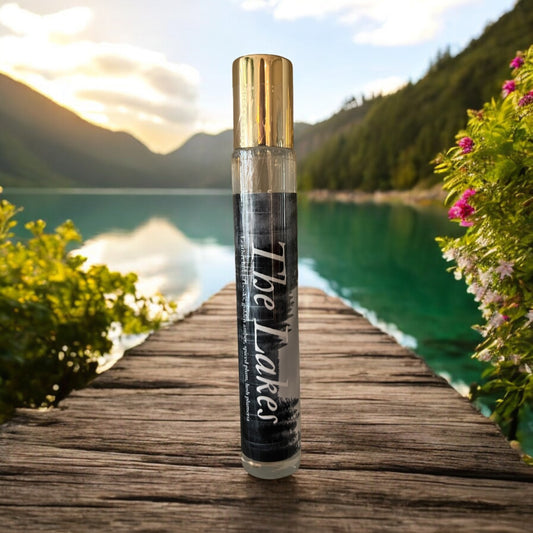 The Lakes is a perfume oil with notes of Spiced plum, plumeria, Mandarin, rosemary, lavender, ginger, clove, golden amber, vanilla musk