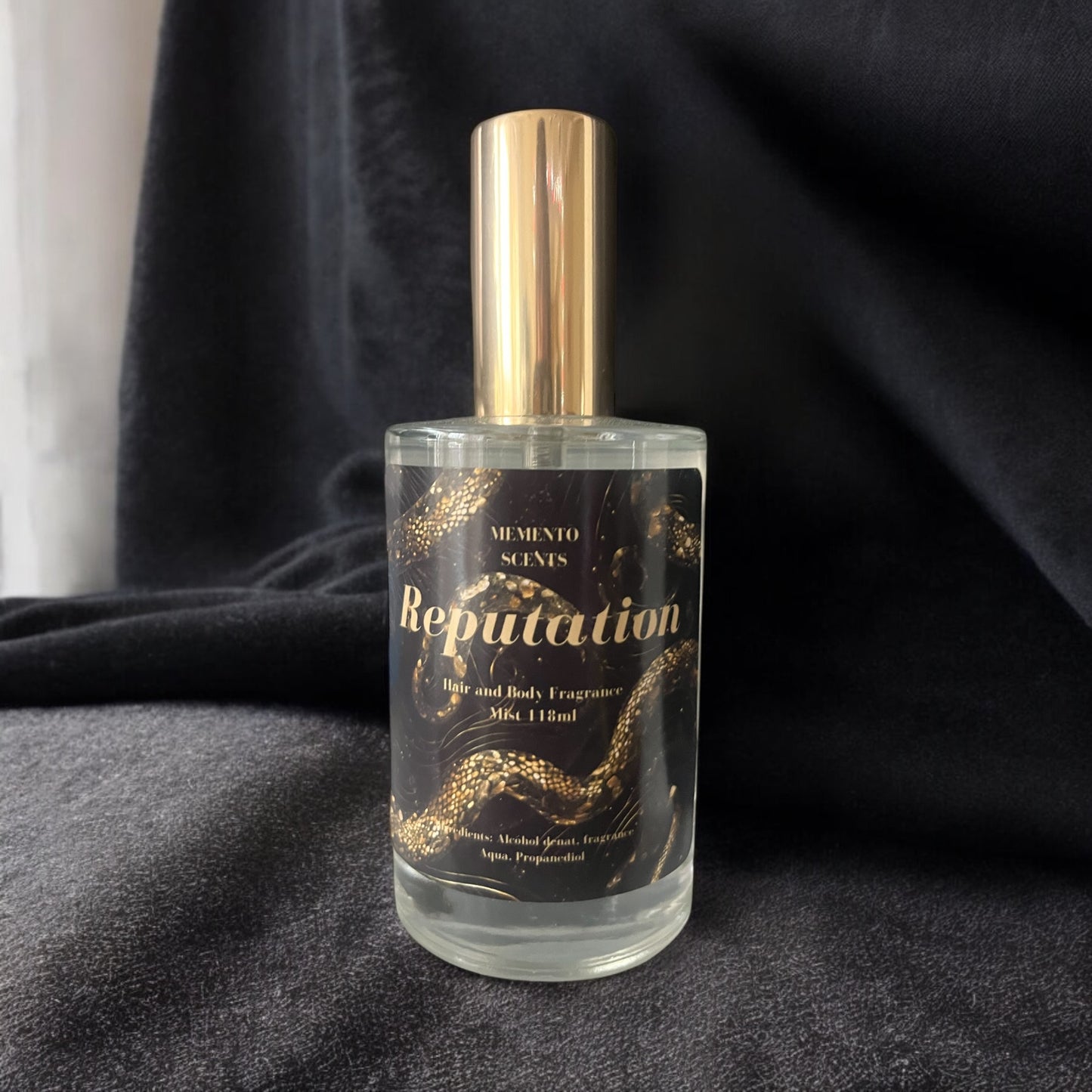Reputation a hair and body mist with notes of wine, cinnamon, blackcurrants and aged oak
