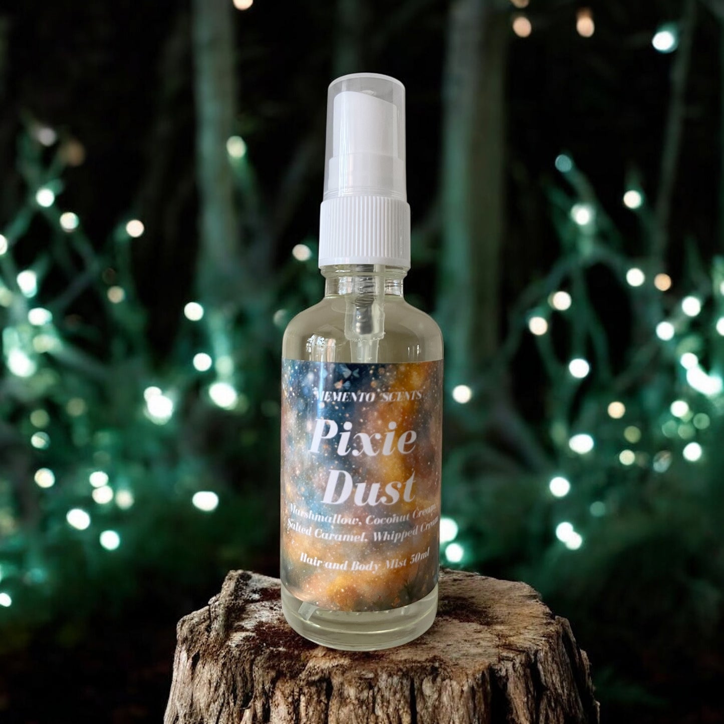 A bottle of Pixie Dust hair and body mist on a tree stump surround by a forest of pixie lights