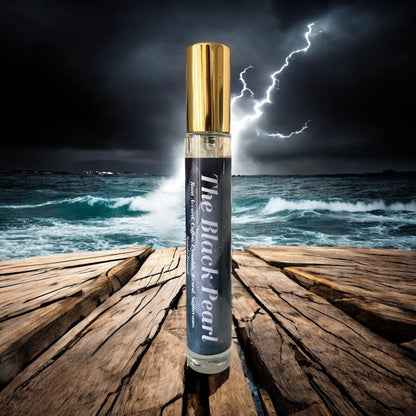 A bottle of Black Pearl perfume on a wooden plank with the stormy dark sea in the background inspired by Pirates of the Caribbean