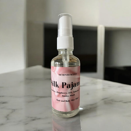 Silk Pajamas hair and body mist with creamy almond milk, vanilla, freesia, and musk, evoking the luxury of silky pajamas 